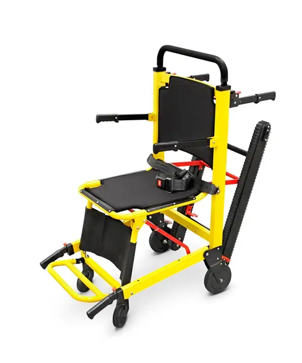 Sedia scendiscale pieghevole con cingoli, utilizzata per evacuazioni sicure su scale, manovrabile da una sola persona, con braccioli e cinture di sicurezza.