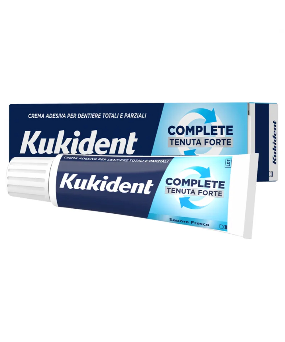 Crema adesiva per dentiere Kukident Complete Fresco con tenuta forte, effetto barriera contro i residui di cibo e freschezza alla menta.