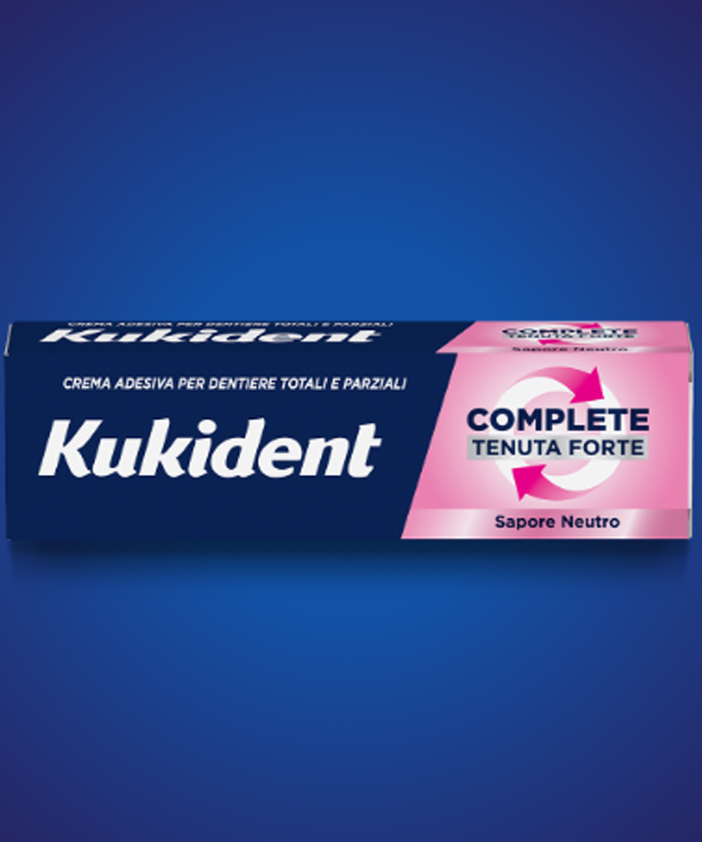 Crema adesiva per dentiera Kukident Complete Neutro 57g, forte tenuta per protesi totali e parziali, comfort elevato e barriera anti-residui.
