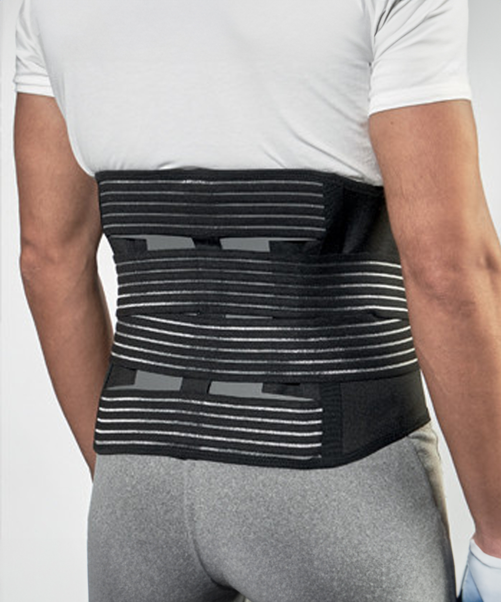 Corsetto lombosacrale LOMBOGIB® TECH con scudo posteriore termoformabile, doppia chiusura e tessuto in Velour per aderenza ottimale.