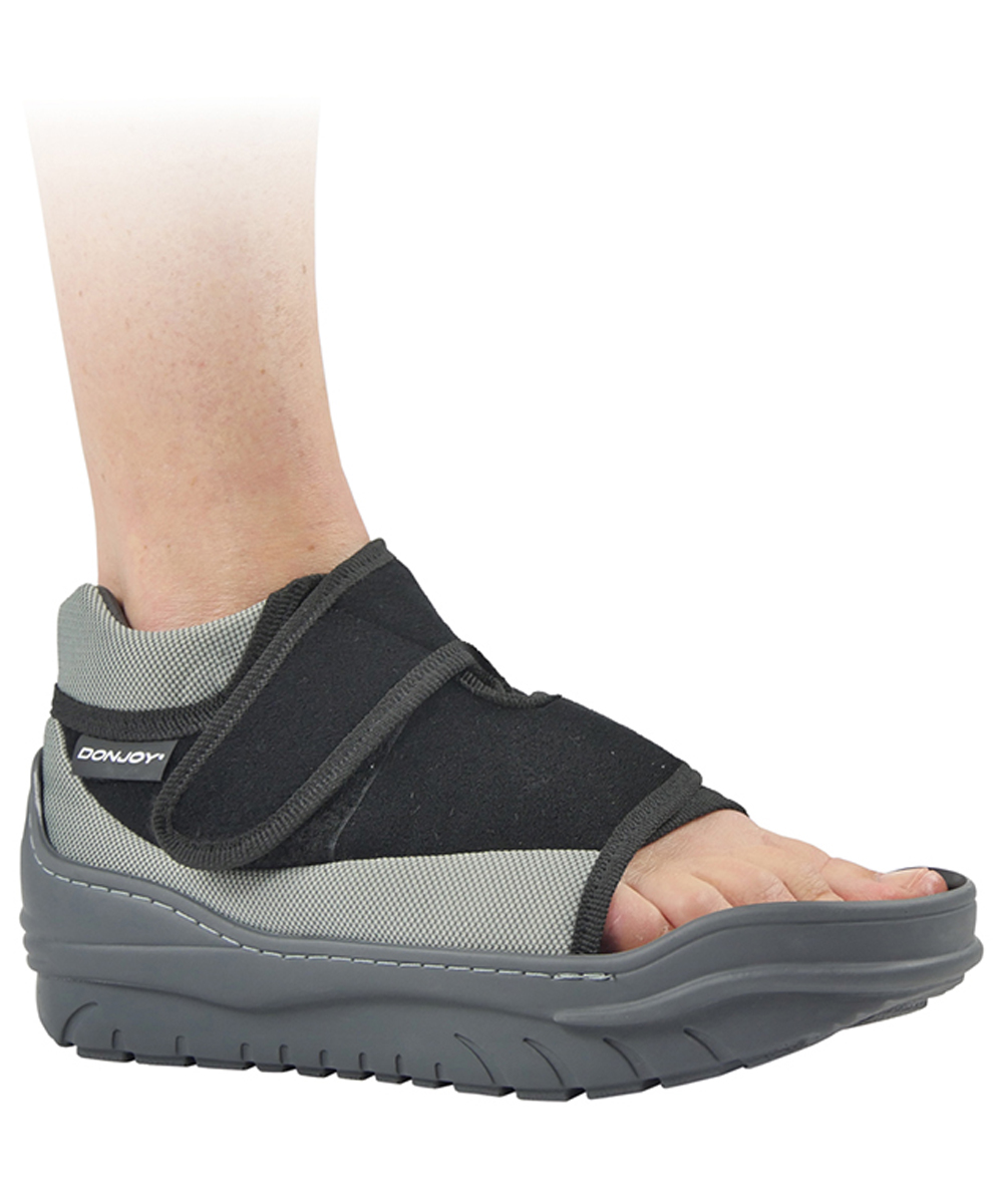 Scarpa Podalux II per supporto post-operatorio del piede, con piastra rigida rimovibile e suola antiscivolo per la sicurezza della camminata.